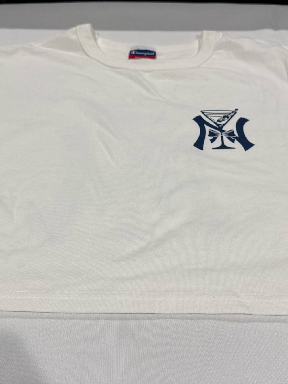 Champion White T-Shirt with Navy Chest Emblem